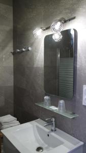 Ванная комната в Hotel Le Colibri