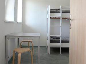 Postel nebo postele na pokoji v ubytování Ubytovna a Cykloubytovna Koupaliště Kadaň