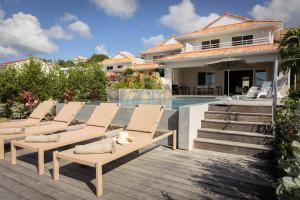 Balkón nebo terasa v ubytování Eden Roc Villas