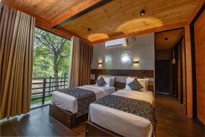 Postel nebo postele na pokoji v ubytování Atha Resort