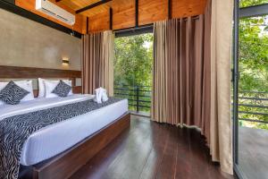Postel nebo postele na pokoji v ubytování Atha Resort