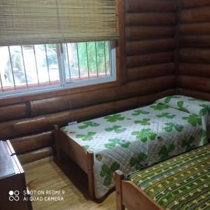 a bedroom with a bed and a window at EZEIZA cedro azul 10 minutes the air port in Ezeiza +21 photos