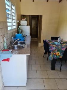Kuchyň nebo kuchyňský kout v ubytování Maison CORVO
