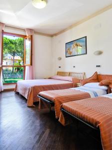 Postel nebo postele na pokoji v ubytování Albergo Bice + 33 fotografií
