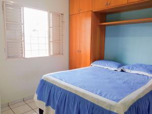 เตียงในห้องที่ Casa Azul Antares 3 Quartos - Pet Friendly