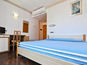 Postel nebo postele na pokoji v ubytování Albergo Bice