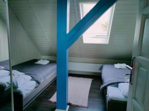 Postel nebo postele na pokoji v ubytování Apartamenty TRZY PTAKI