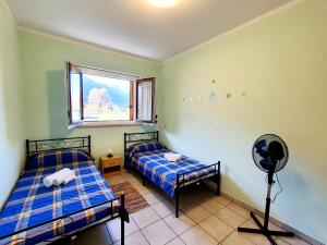 Posteľ alebo postele v izbe v ubytovaní Beach Apartment Cannobio