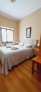 Postel nebo postele na pokoji v ubytování Casa La Barria