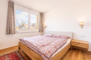 Łóżko lub łóżka w pokoju w obiekcie Ferienwohnung Kerstin