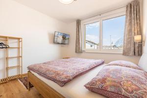 Łóżko lub łóżka w pokoju w obiekcie Ferienwohnung Kerstin