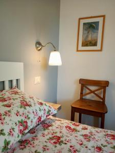 A bed or beds in a room at RossoMattone CountryHouse Még 37 kép