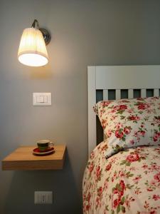 A bed or beds in a room at RossoMattone CountryHouse