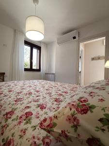 A bed or beds in a room at RossoMattone CountryHouse