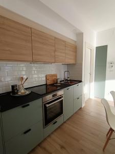 A kitchen or kitchenette at RossoMattone CountryHouse
