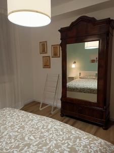 A bed or beds in a room at RossoMattone CountryHouse