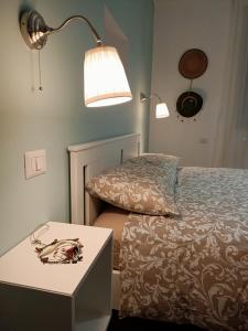 A bed or beds in a room at RossoMattone CountryHouse