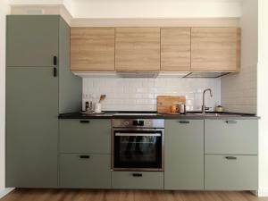 A kitchen or kitchenette at RossoMattone CountryHouse