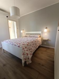 A bed or beds in a room at RossoMattone CountryHouse