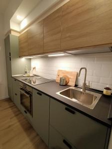 A kitchen or kitchenette at RossoMattone CountryHouse