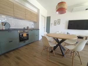 A kitchen or kitchenette at RossoMattone CountryHouse