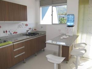 Kuchyň nebo kuchyňský kout v ubytování Condominio Terrazas del Sol