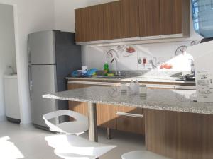 Kuchyň nebo kuchyňský kout v ubytování Condominio Terrazas del Sol
