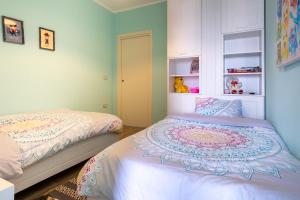a bedroom with two beds in a room at Sunset House in Vlorë +70 photos