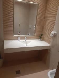A bathroom at Rin Grand Hotel
