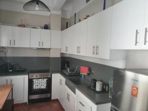 Kuchyň nebo kuchyňský kout v ubytování Callisto room 2 + 34 fotografií