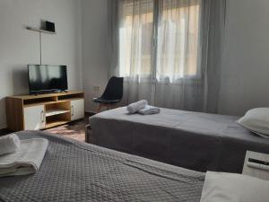 Postel nebo postele na pokoji v ubytování Callisto room 2