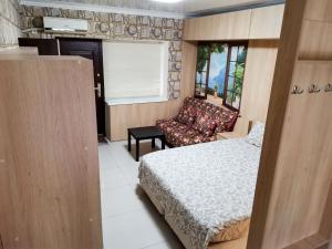 En eller flere senger på et rom på Guest House Morskaya 265