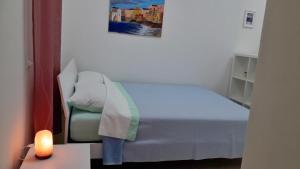 Letto o letti in una camera di MAX in CENTER parking privato nel prezzo