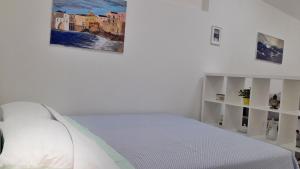 Letto o letti in una camera di MAX in CENTER parking privato nel prezzo