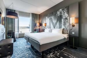 Postel nebo postele na pokoji v ubytování Radisson Blu Metropol Helsingborg