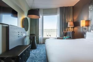 Postel nebo postele na pokoji v ubytování Radisson Blu Metropol Helsingborg