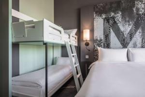 Postel nebo postele na pokoji v ubytování Radisson Blu Metropol Helsingborg