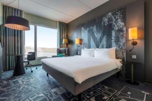 Postel nebo postele na pokoji v ubytování Radisson Blu Metropol Helsingborg