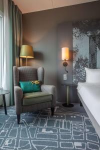 Postel nebo postele na pokoji v ubytování Radisson Blu Metropol Helsingborg