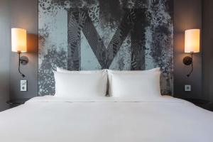 Postel nebo postele na pokoji v ubytování Radisson Blu Metropol Helsingborg