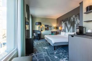 Postel nebo postele na pokoji v ubytování Radisson Blu Metropol Helsingborg