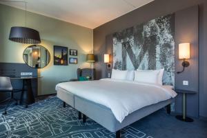 Postel nebo postele na pokoji v ubytování Radisson Blu Metropol Helsingborg