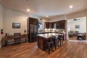 an open kitchen and living room with a large island at Boulder Ridge in Yosemite West