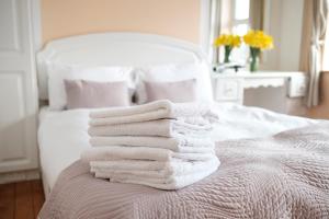 Voodi või voodid majutusasutuse Glensheen toas
