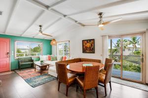 a living room with a table and a couch at AJ's Hideout in Little Torch Key