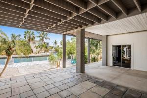 an open patio with a pool in a house at AJ's Hideout in Little Torch Key