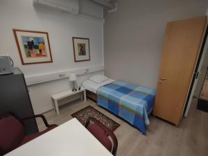 Postel nebo postele na pokoji v ubytování Hotel 24 - Karihaara - Kemi