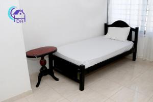 Postel nebo postele na pokoji v ubytování HOTEL DOÑA ANA
