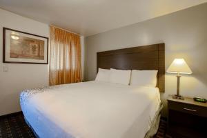 Ένα ή περισσότερα κρεβάτια σε δωμάτιο στο Star Route 66 Grand Canyon