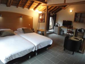 Postel nebo postele na pokoji v ubytování Parkhotel Villa des Effats Vielsalm